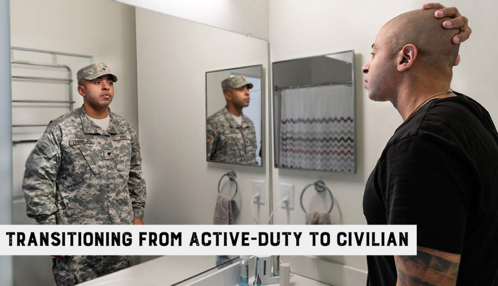 a man of color stands in civilian clothes with his hand on his head, he's looking into the mirror at his own reflection, but the reflection is wearing a us army uniform
