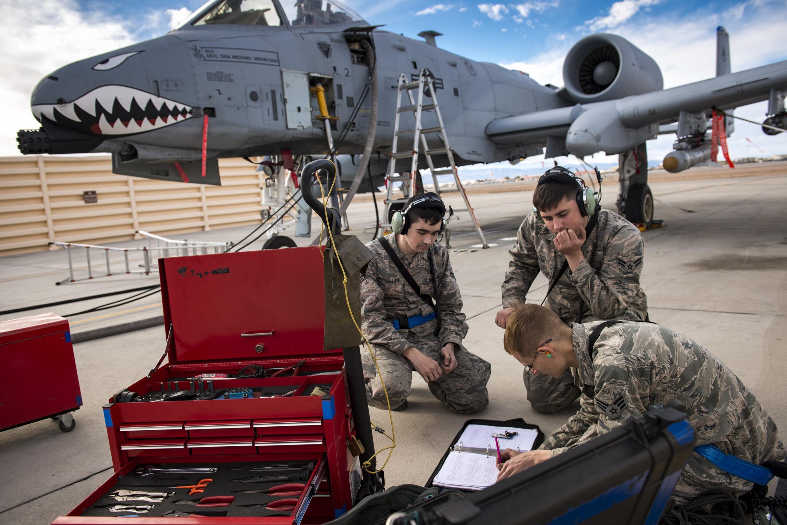 Air Force Aircraft Maintainers work on a plane