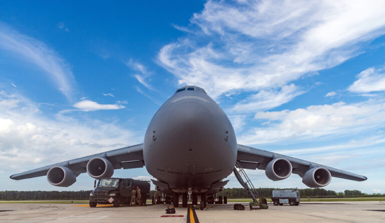 Dover AFB showcases a large aircraft (called the C-5M) being refueled